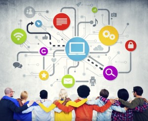 Group Of Multi-Ethnic People Hands On Shoulders Facing Global Co